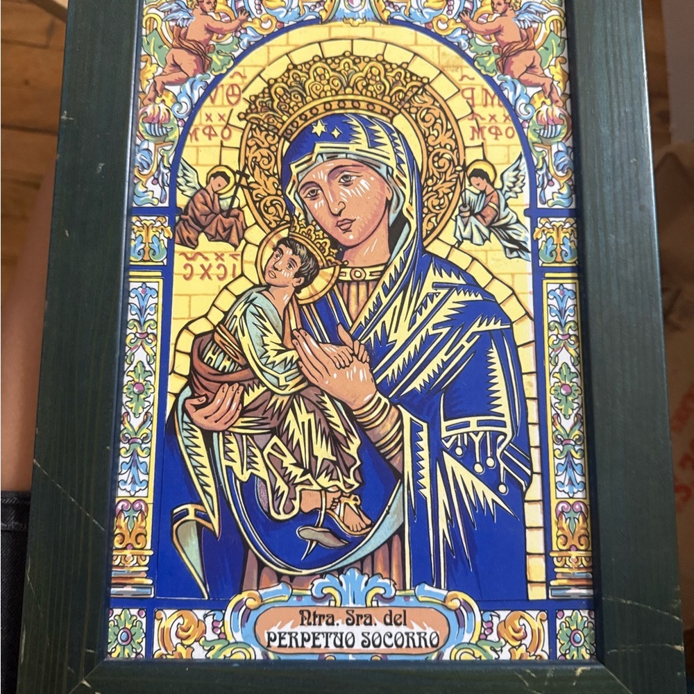 Religious Ceramic Art with Blue and Gold Accents